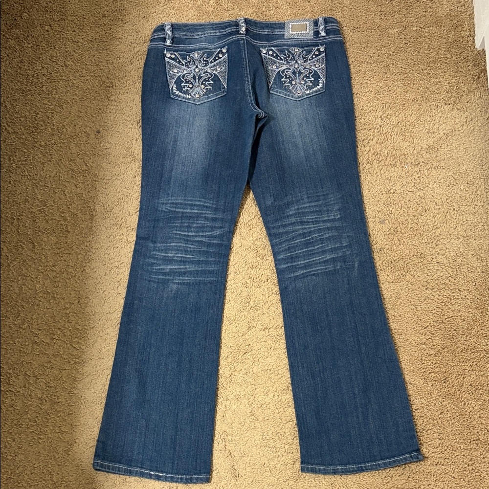 Blue Flare Jeans with Embroidered Pockets and Gems